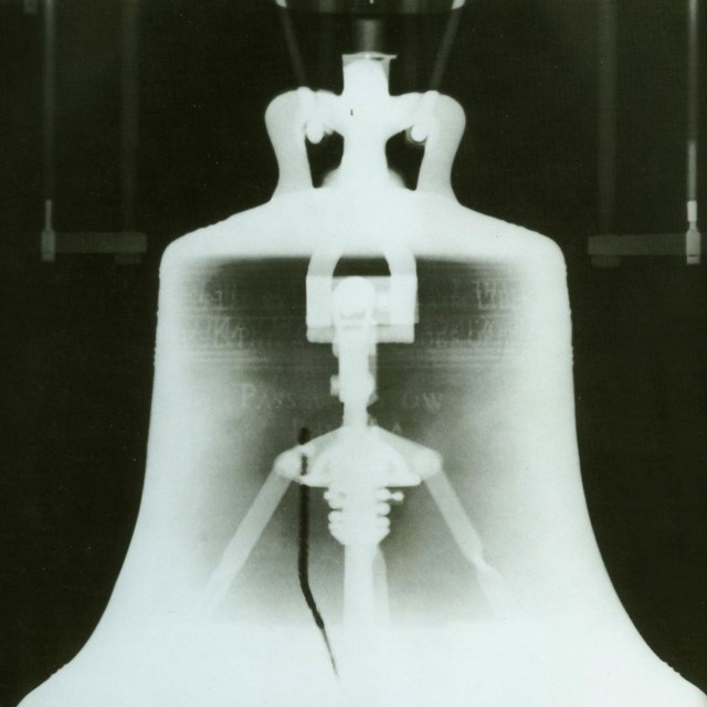 Black and white photo showing an X-ray of the Liberty Bell.