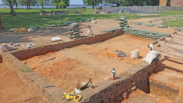 An archaeological dig exposes the foundations of many buildings.