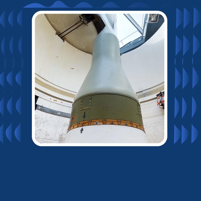 Photo of missile room with massive implements 
