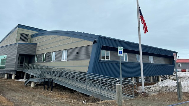 A wheelchair ramp going up to the Northwest Arctic Heritage Center 