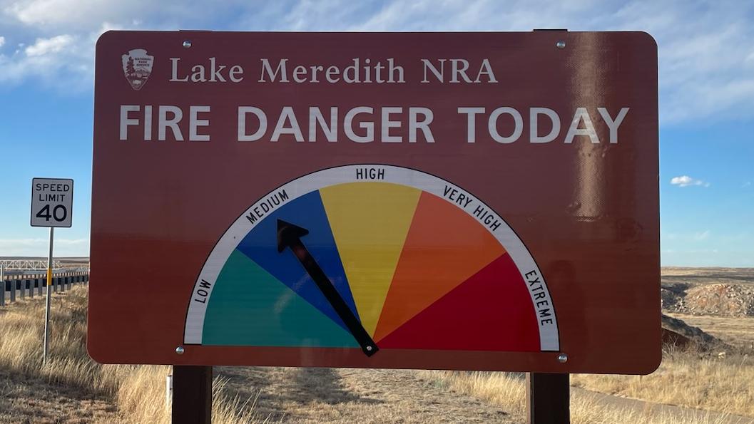 Brown sign, "Lake Meredith N.R.A. fire danger today, low, medium, high, very high, extreme"