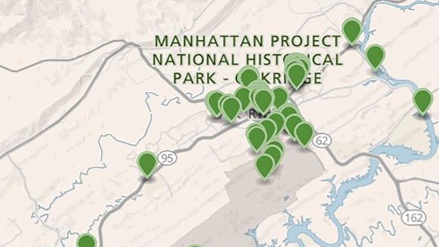 A color graphic of a map with green location tags around Oak Ridge, TN.