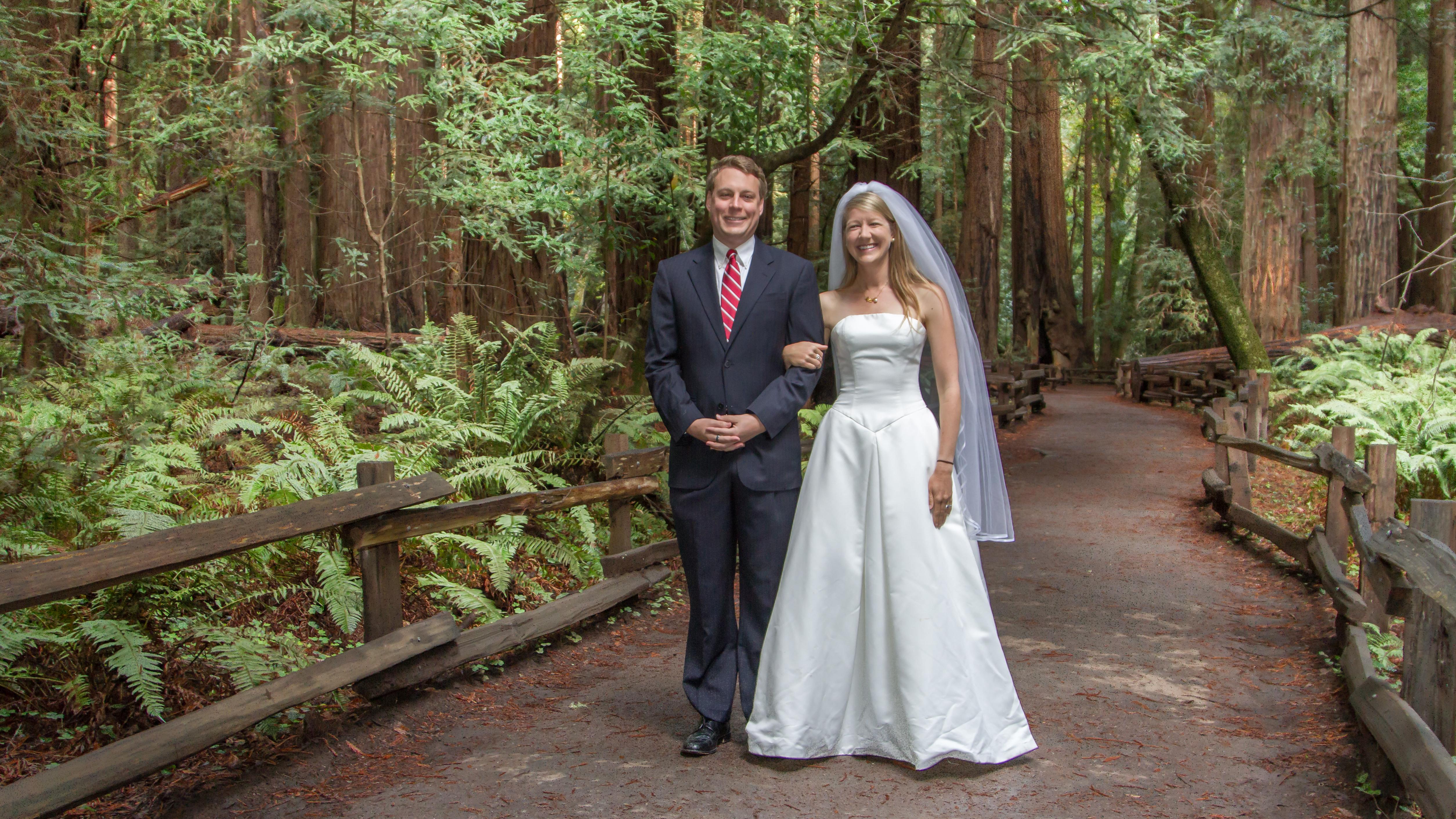 A bride and groom among the redwoods