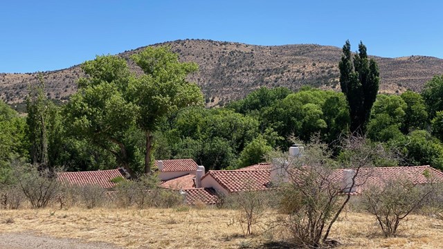 Landscape view of Hurd-Wyeth House and Studios complex against mountain backdrop