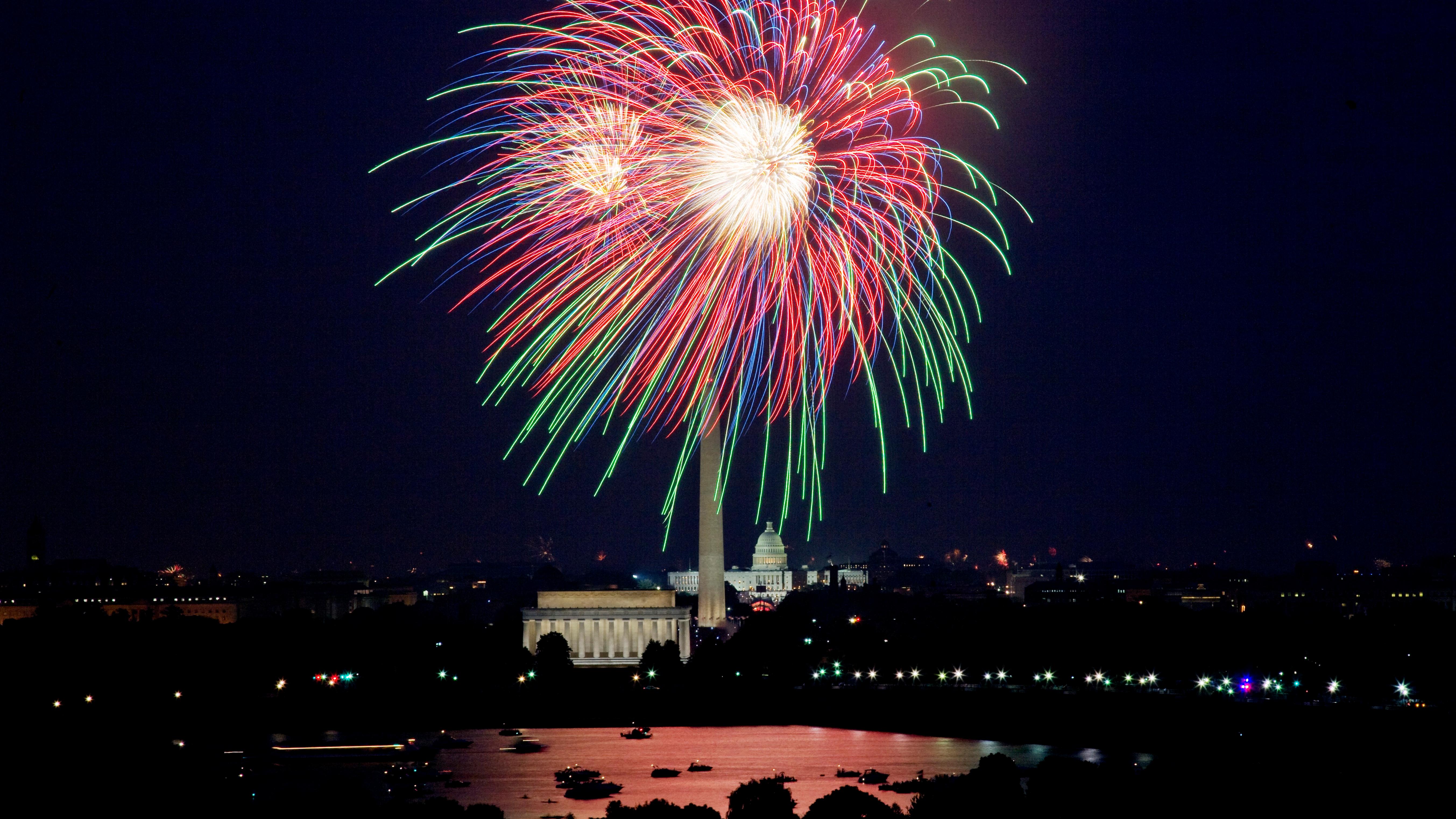 Colorful fireworks over DC memorials
