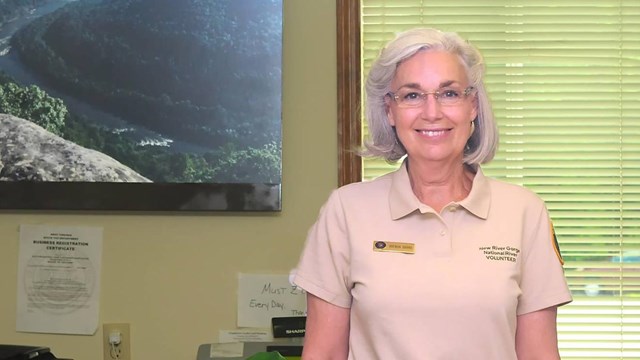 volunteer behind desk