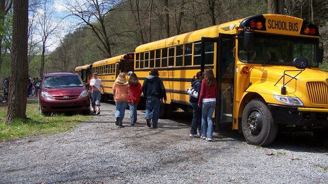 students and school bus