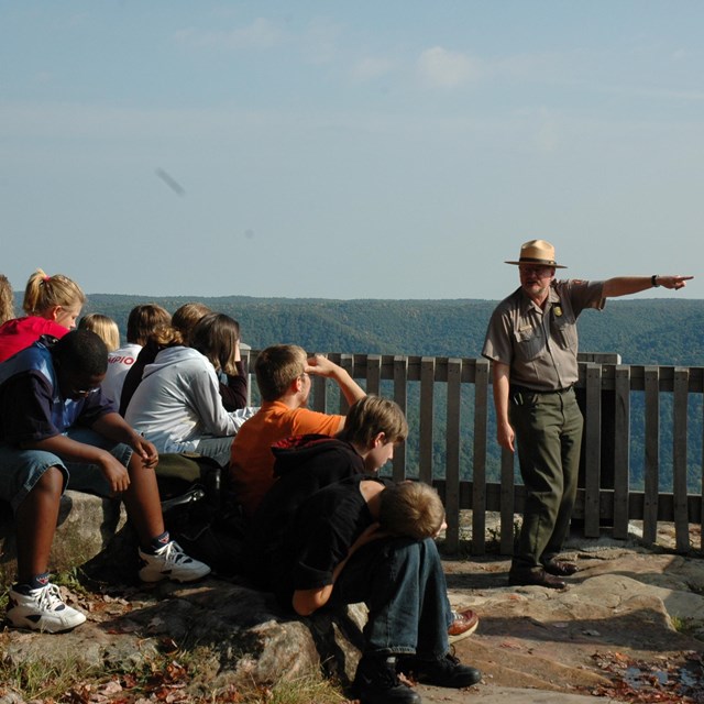 ranger at overlook with students