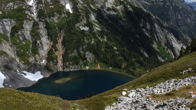 An alpine lake with mountains