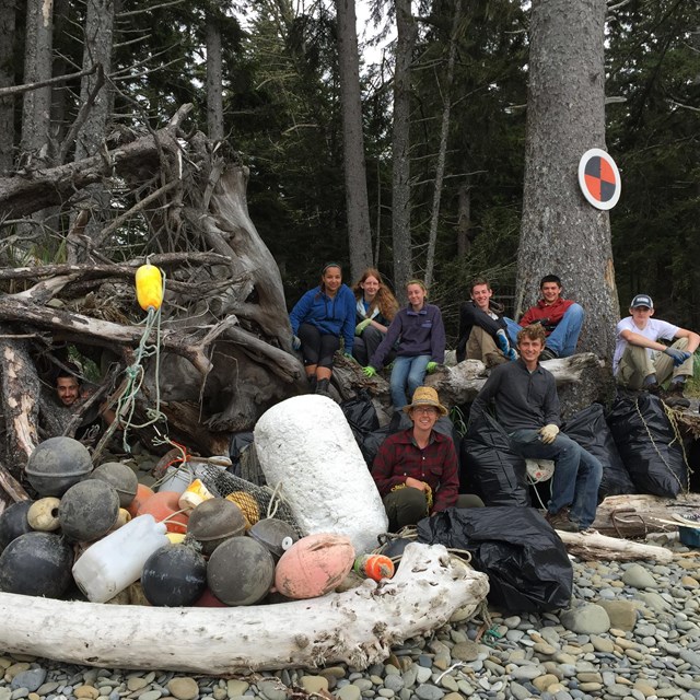 Student Conservation Association Members with Marine Debris