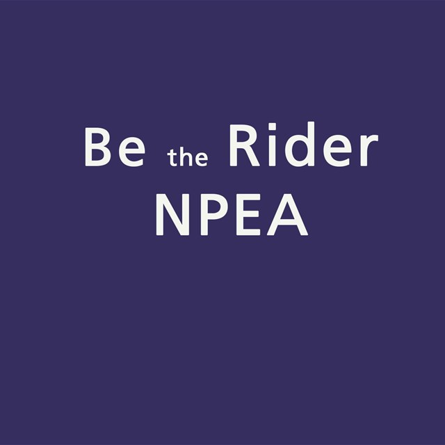 Blue background, white text, Be the Rider N.P.E.A.