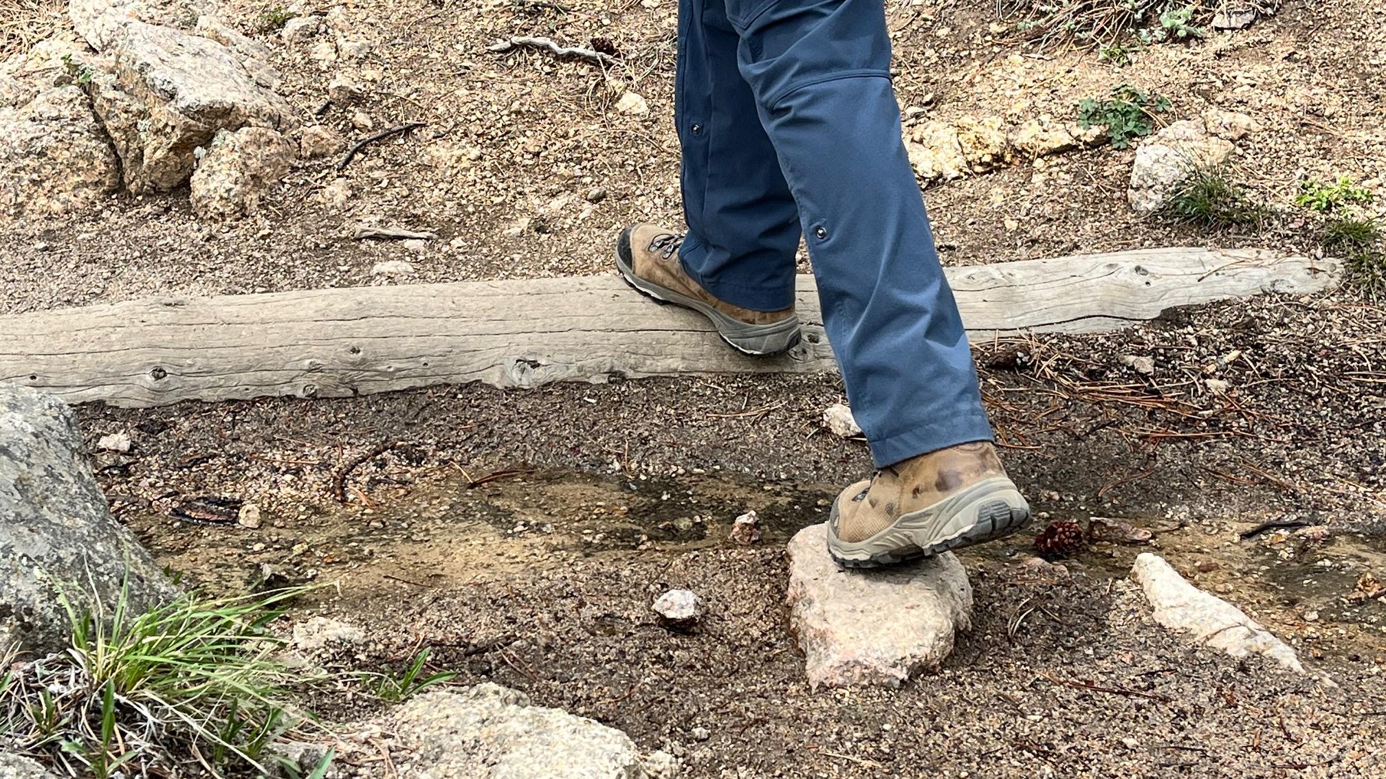 A person is hiking on a trail