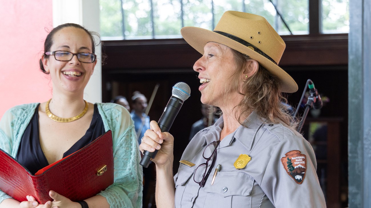 ranger speaking into a microphone