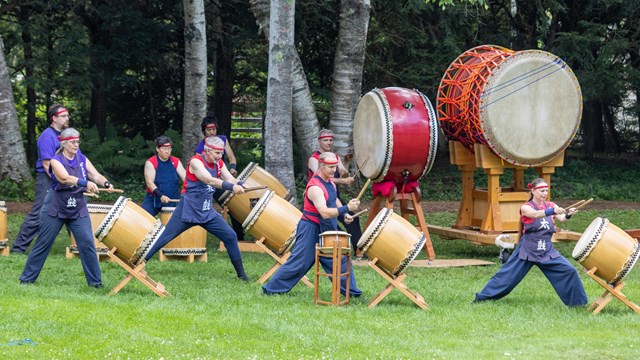 Japanese drummers on park grounds