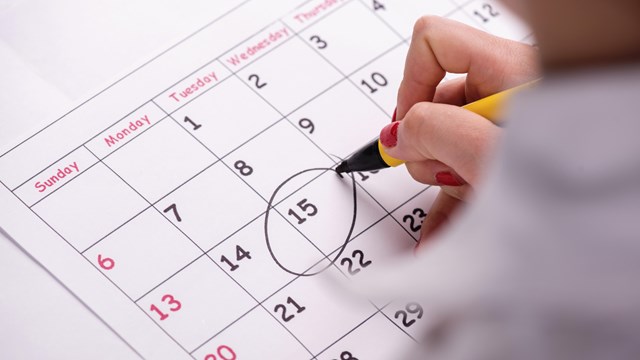 A calendar with a date circled in marker.