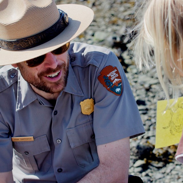 Park Ranger talking to child