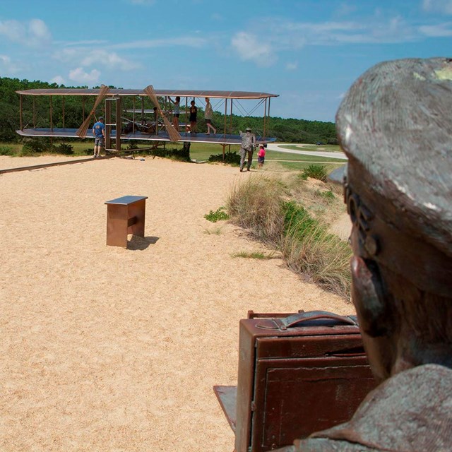 sculpture depicting the Wright Brothers' first flight. NPS photo