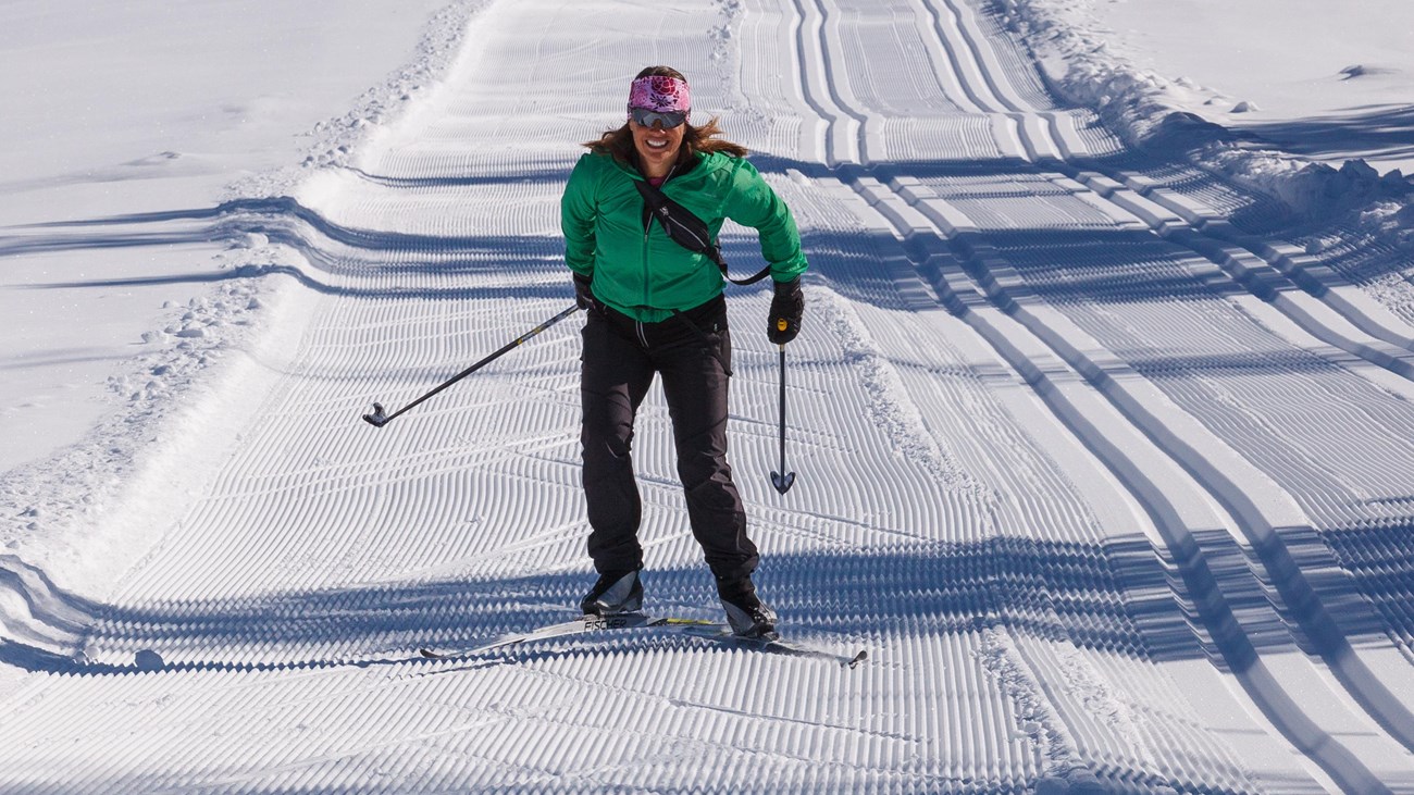 Skate skier skiing on the Teton Park Road