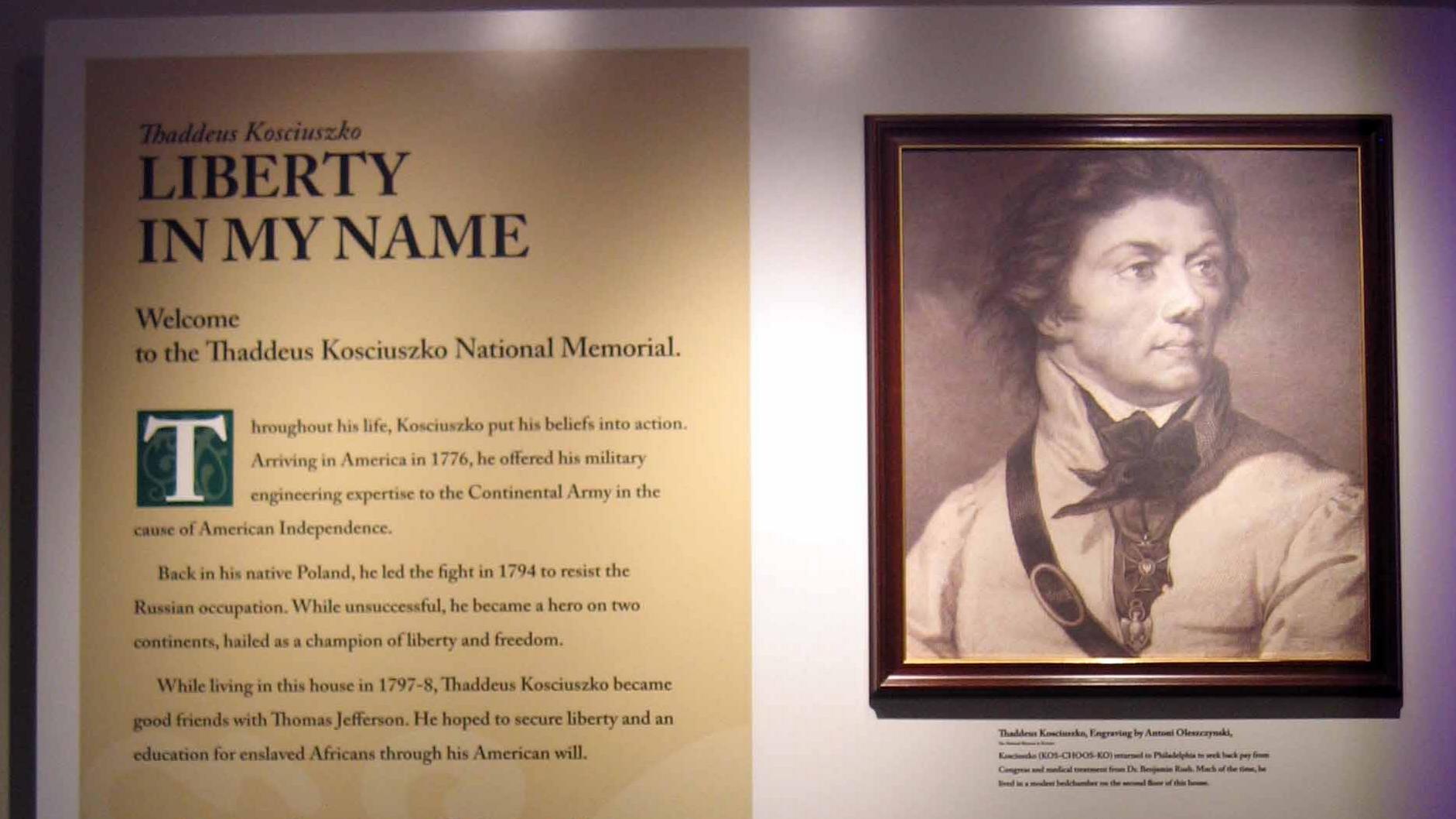 Close up of an exhibit panel featuring images of Kosciuszko and the text "Liberty in my Name."
