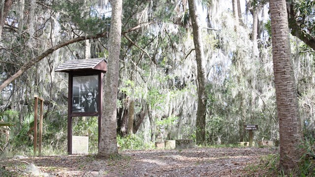 former cabin site of willie browne, with sign and representative doorway 