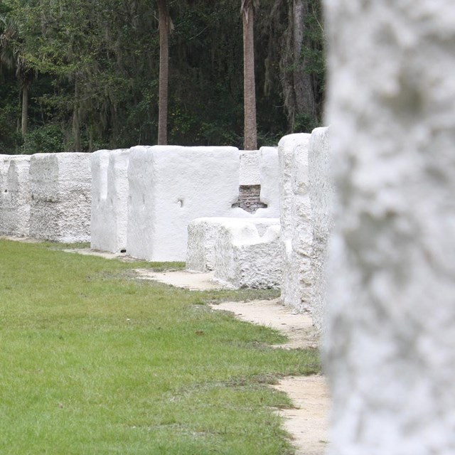 tabby white slave cabins stretch in an arch 