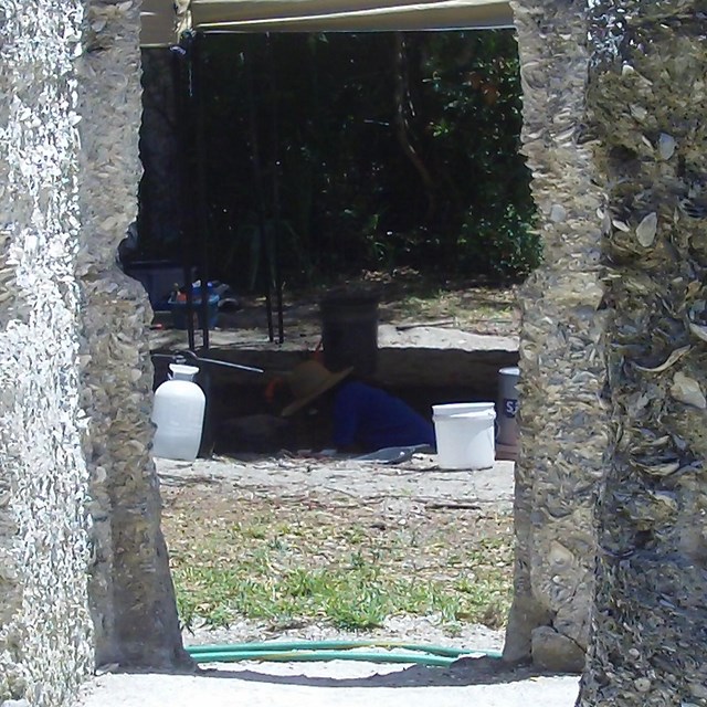 dig site seen from inside tabby slave cabin