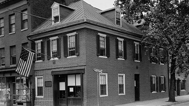 Photograph of the front and side of the Star-Spangled Banner Flag House. 