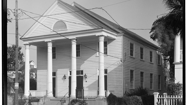 Black and white photo of church. 