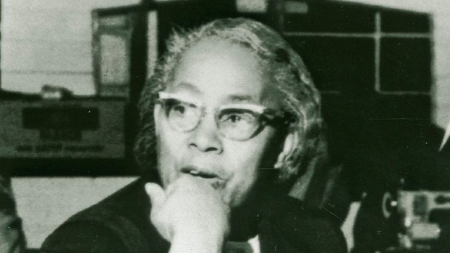 Septima Clark sitting at desk. 