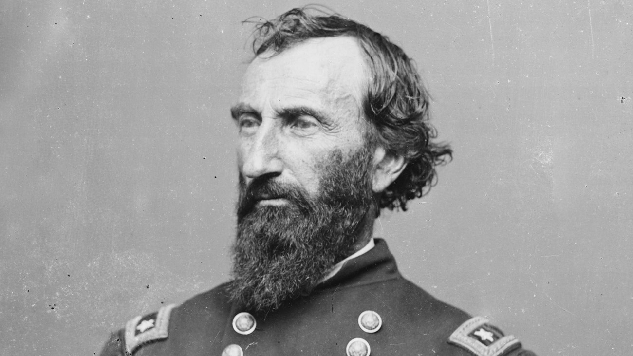 A black and white image of John McClernand sitting down wearing a Union generals uniform.