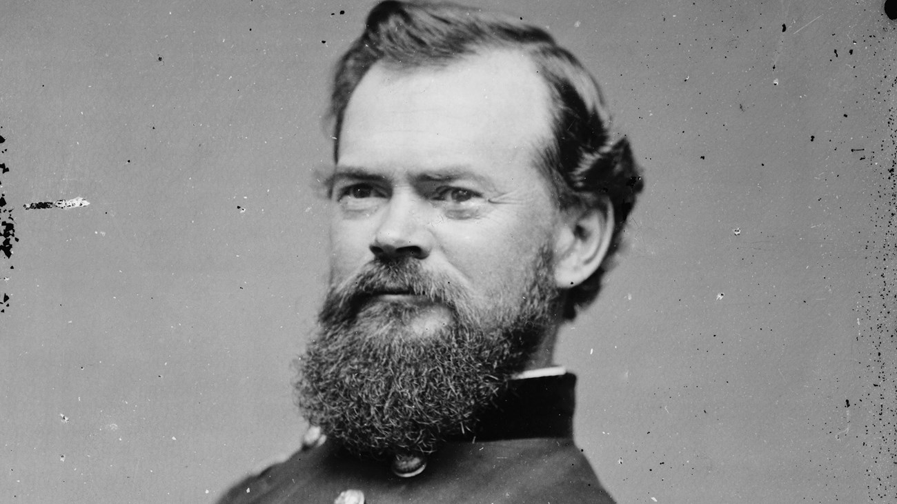 A black and white image of James B. Pherson sitting in Union generals uniform.