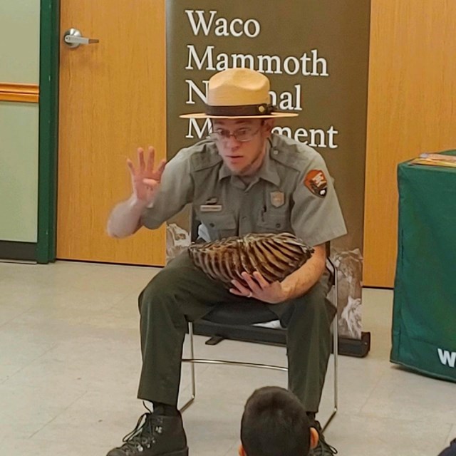 A Ranger giving a program to children