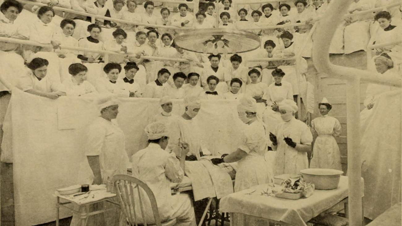 Women wearing white in surgical theater