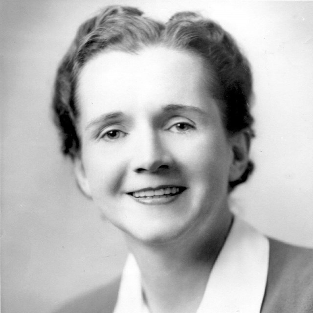 Black and white photo of a woman with short hair