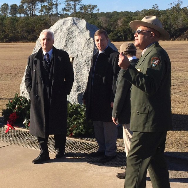 Ranger in front of First Flight Boulder