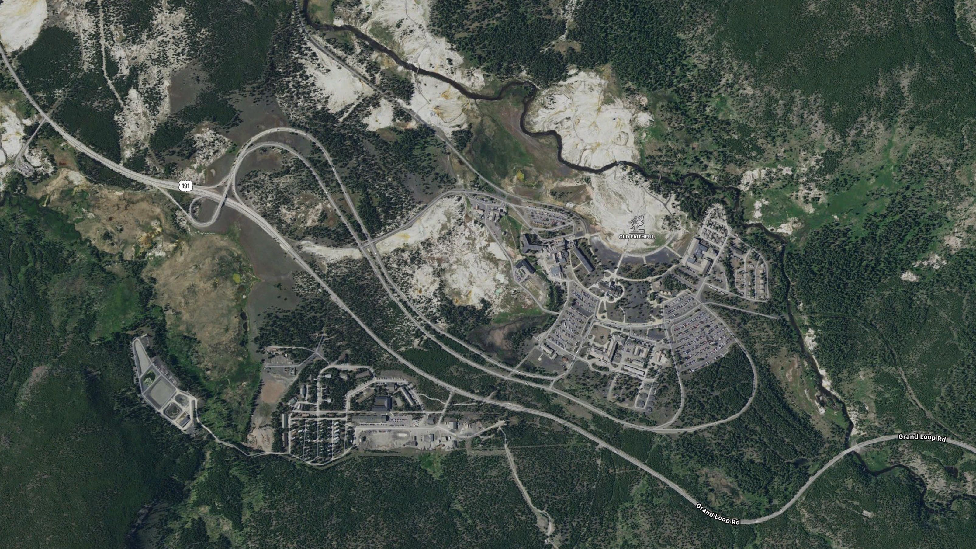 Satellite view showing the main roads and facilities around Old Faithful Geyser.