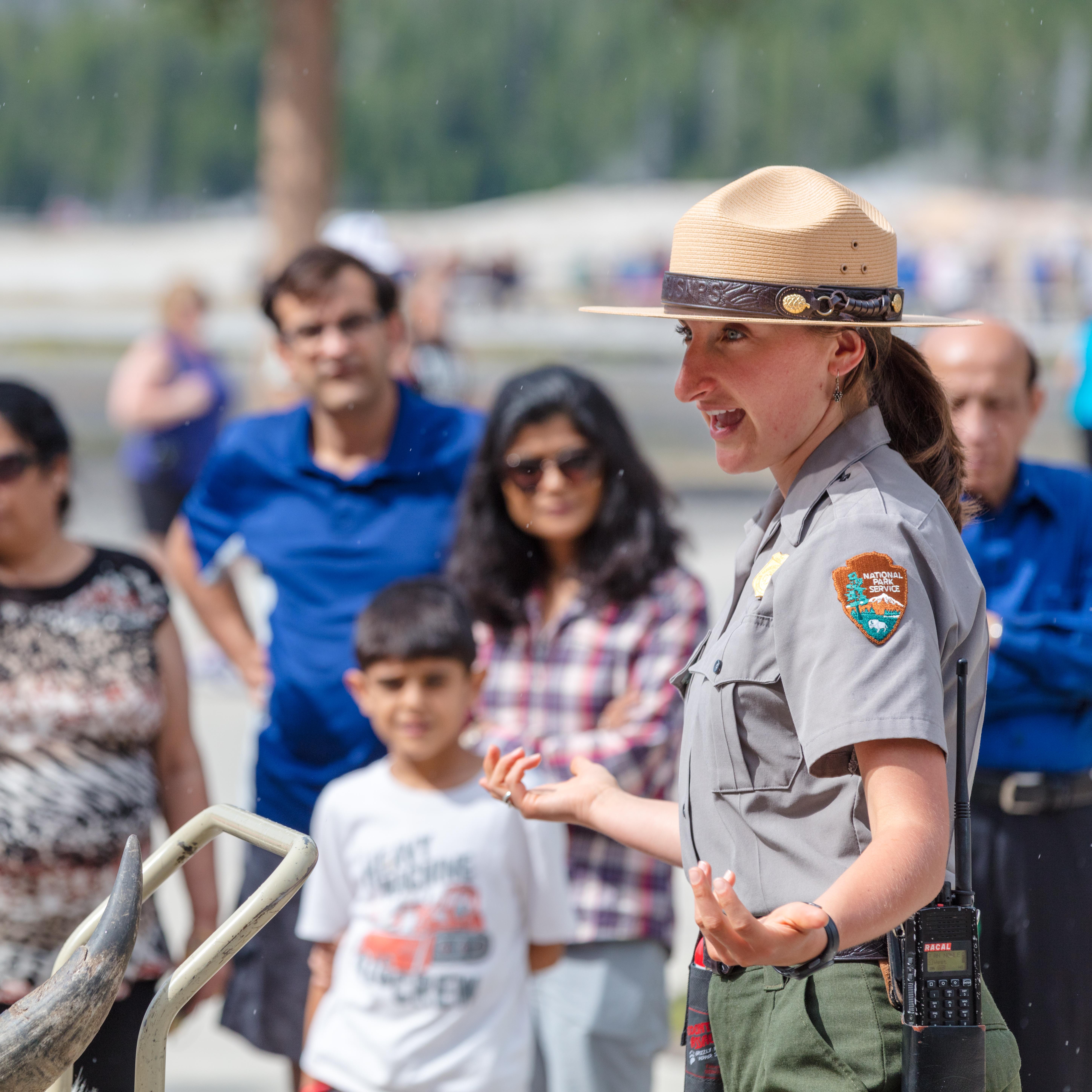 Ranger talking to a group of people.