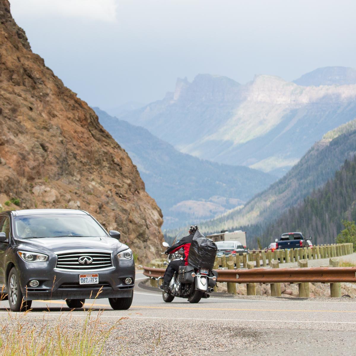 Photo of cars and motorcycles driving up Sylvan Passs