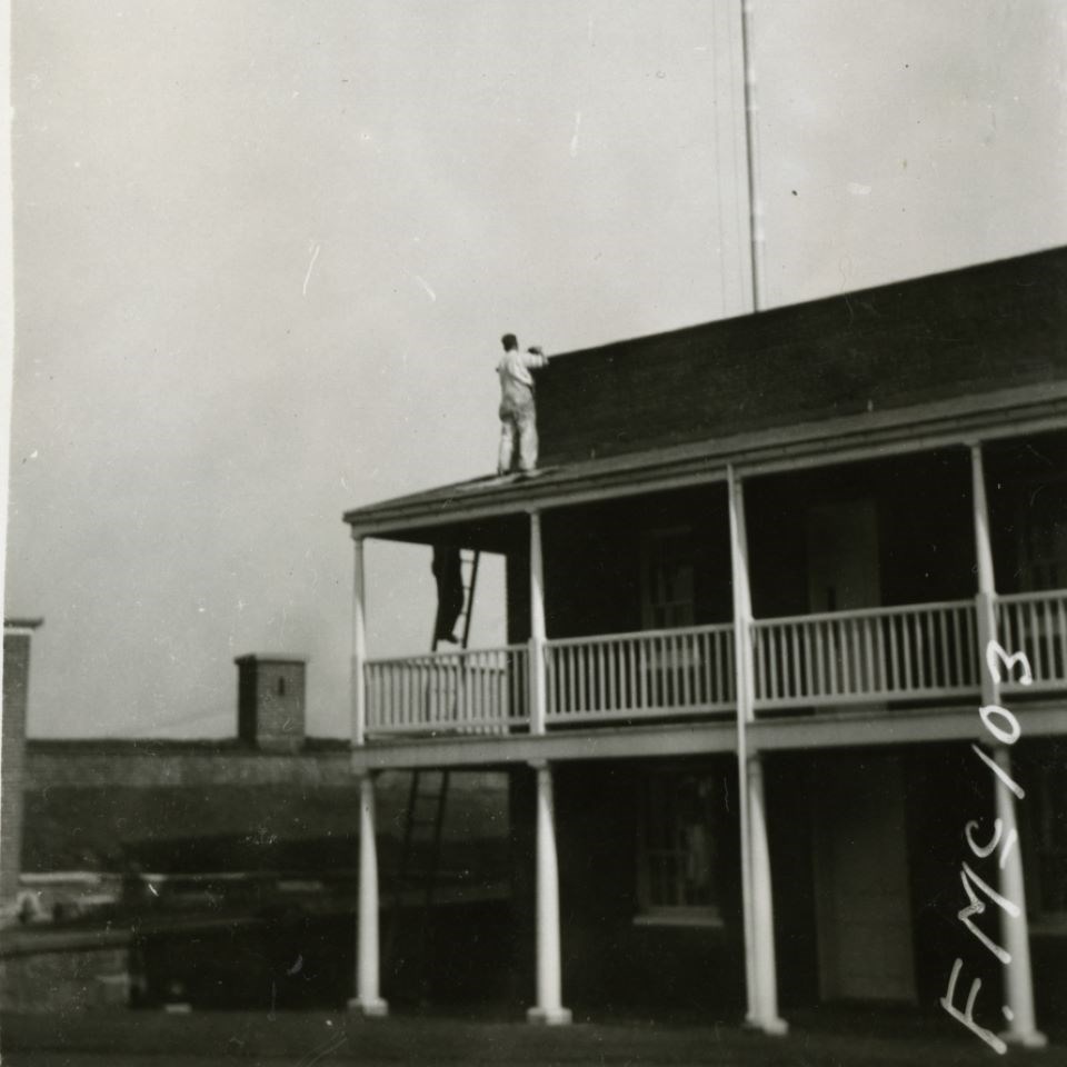 As a maintenance pair works on a former military barracks inside the Fort, we see how the flag mast stands inaccurately to where it stood during the Defense of Fort McHenry.