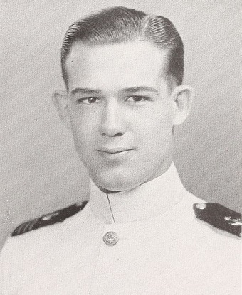 Headshot of Lieutenant Commander Wallace in his naval uniform.