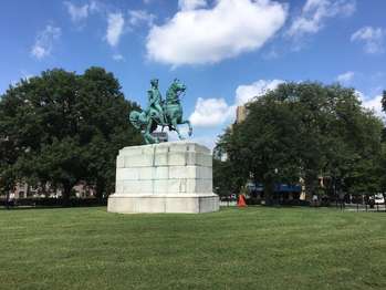 A statue of General George Washington riding a horse