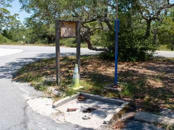 Dump station facility near a paved road.