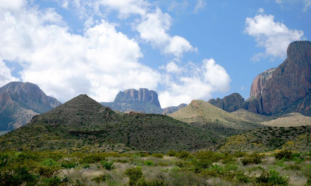 Peaks and rugged terrain against a partly cloudy sky at Big Bend National Park