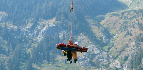 Rangers train for carrying a victim using short-haul rescue techniques.