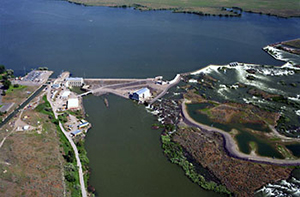 Sky view of Minidoka Powerplant and Minidoka Dam surrounded by water