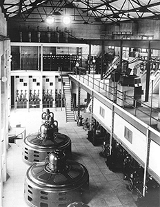Black and white photo of electric units inside of Minidoka Powerplant 