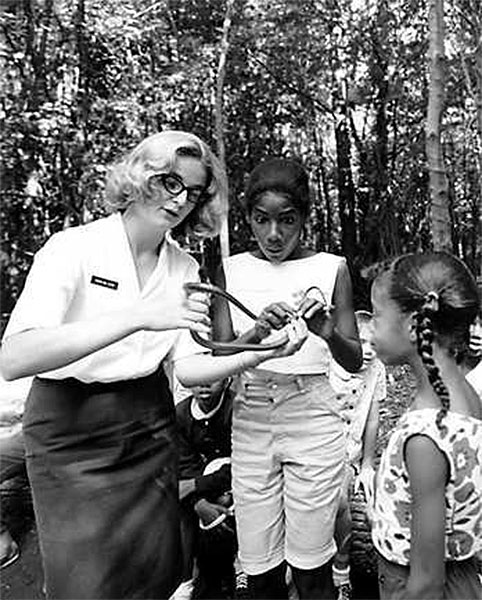 Ranger Susan shows a snake to day campers