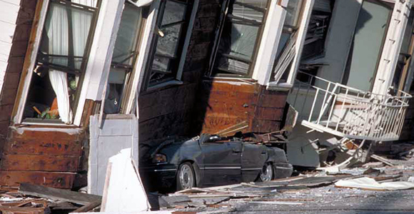 home drastically damaged by an earthquake