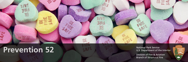 Colorful heart valentines day candies that says be safe.