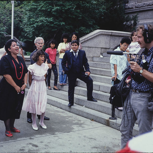 Latinx people singing being recorded as part of the puerto rican festival. Library of Congress